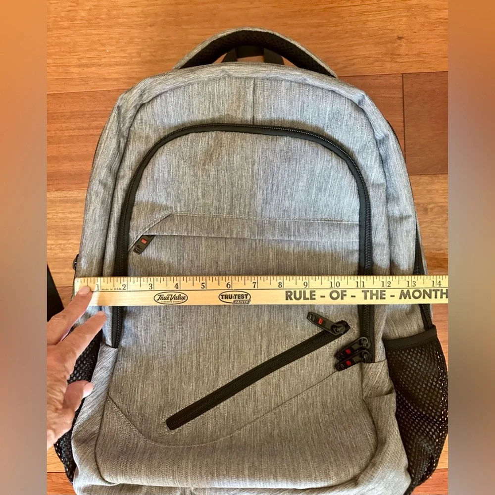 Backpack Excellent condition! Lots of zip compartments. Grey black. Clean!